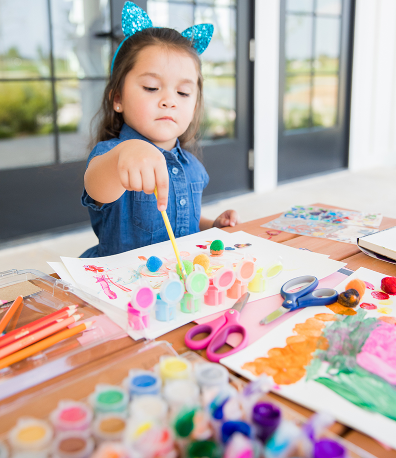 little girl painting at Sandbrock Ranch